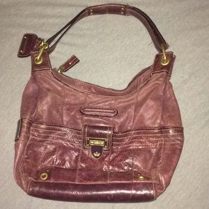 Purple 100% leather outside Juicy Couture Purse
